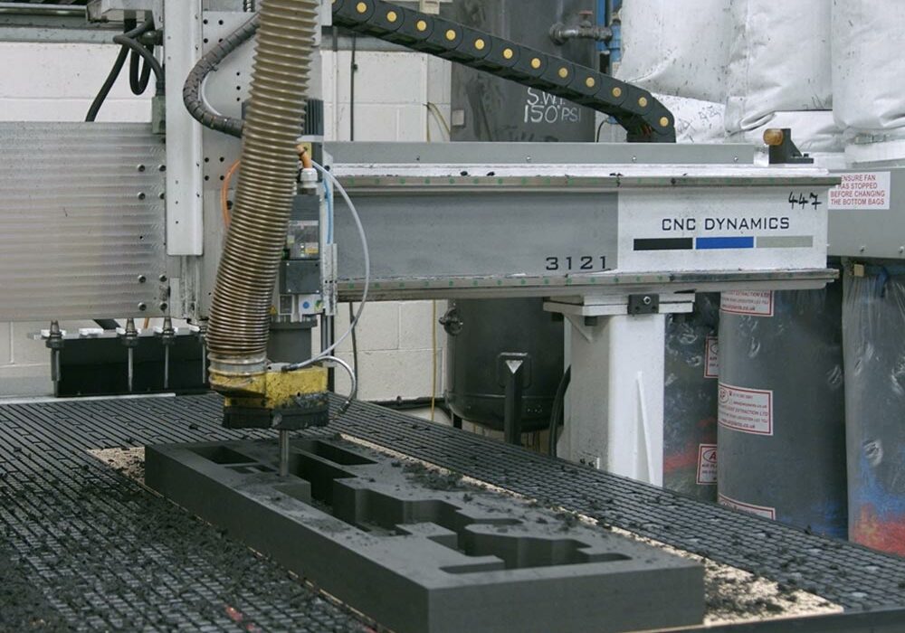 CNC foam cutting CNC foam cutting equipment creating large inserts in a factory