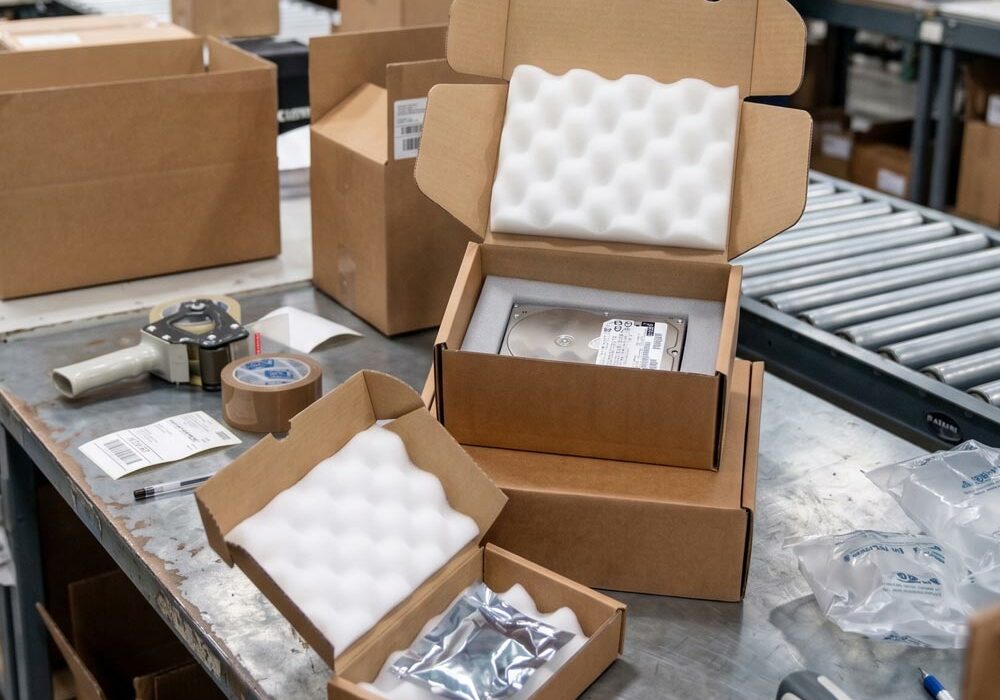Foam inserts for boxes Boxes with foam inserts on a packing bench