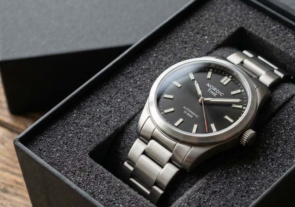 A watch in a jewellery box with custom foam insert