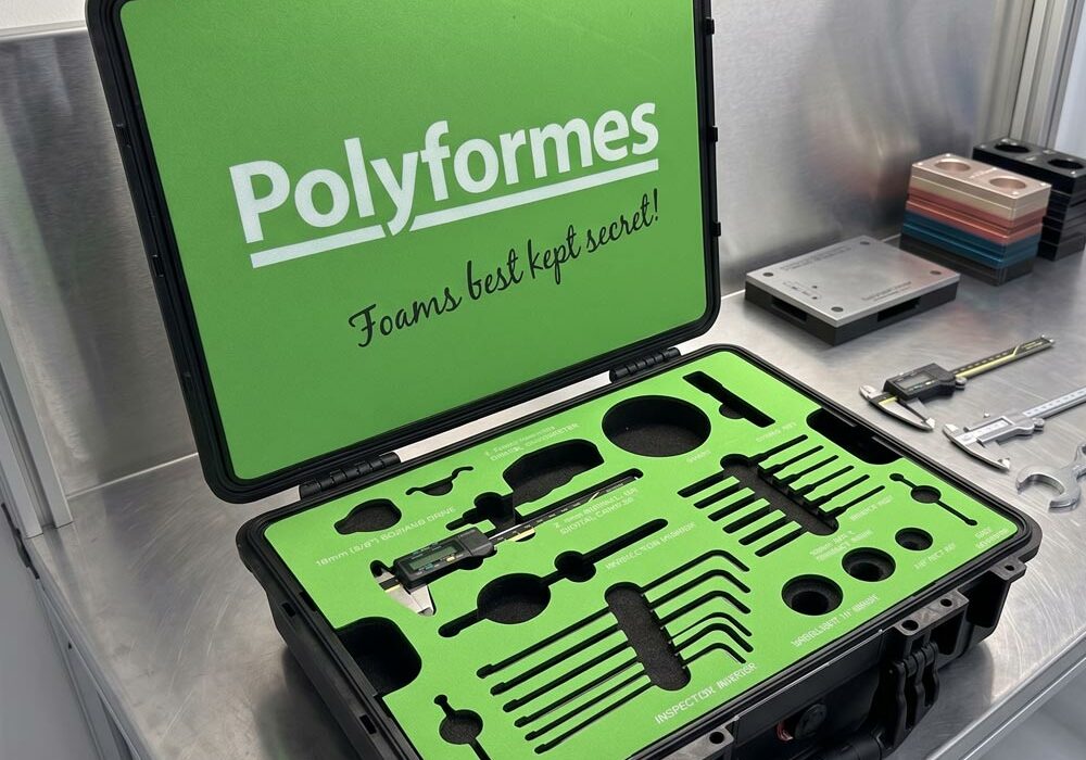 Protective cases A protective case with foam inserts on a workbench