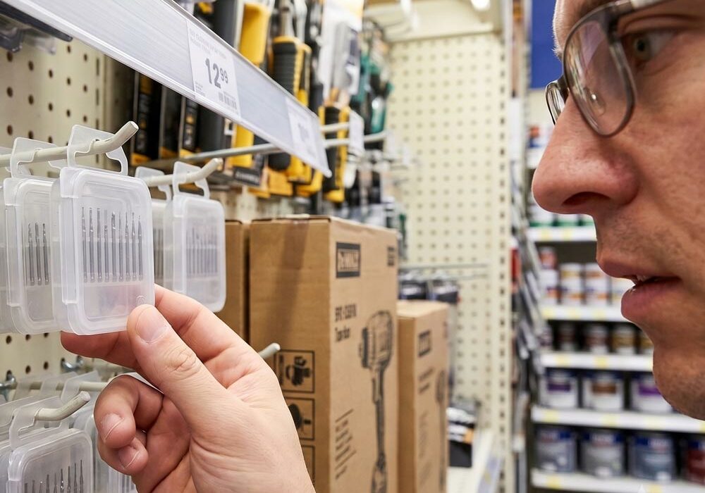 A person looking at products in Unibox retail packaging
